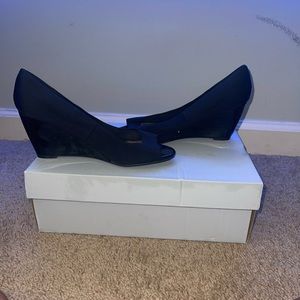 WORN BLACK BANDOLINO HEELS